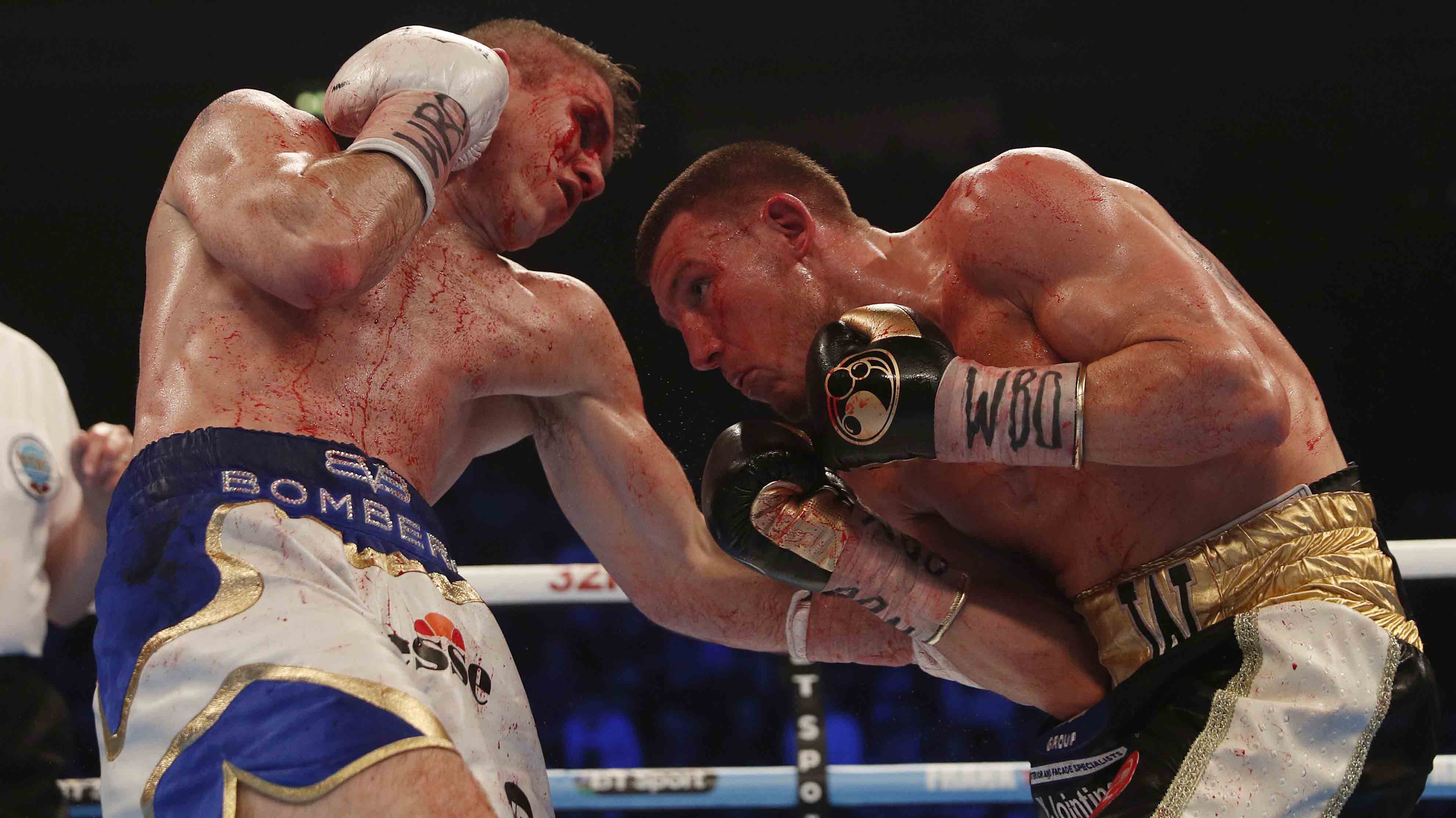 Liam Smith (L) in action with Liam Williams