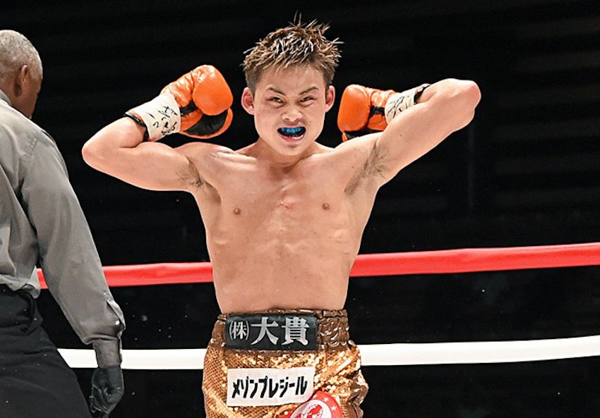 KYOGUCHI RETAINS TITLE