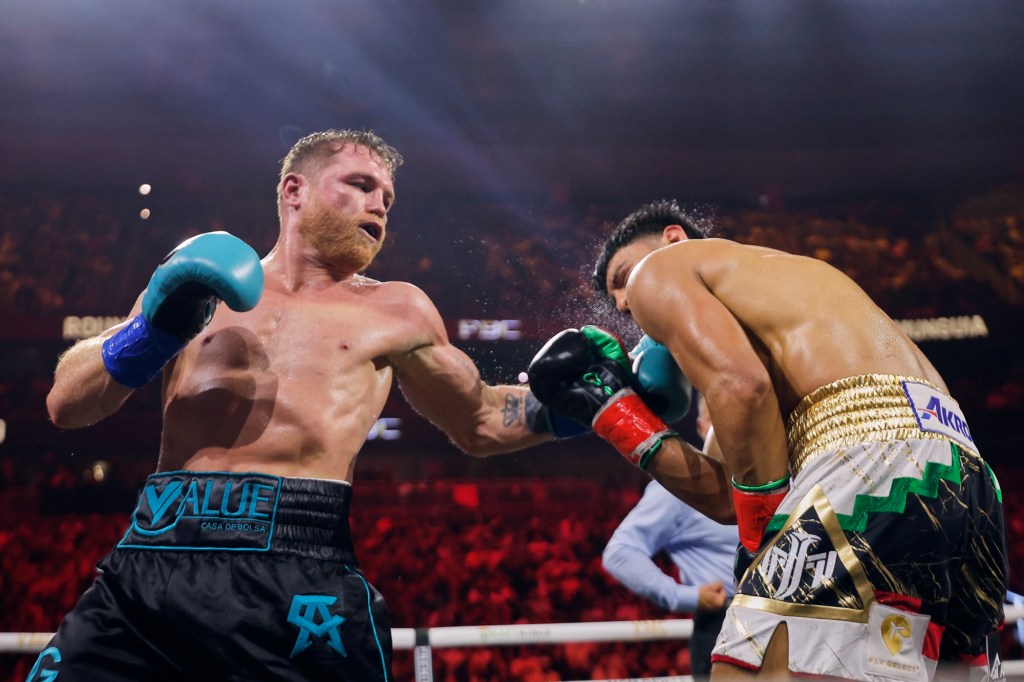 CANELO UNDISPUTED IN VICTORY OVER&nbsp;MUNGUIA!